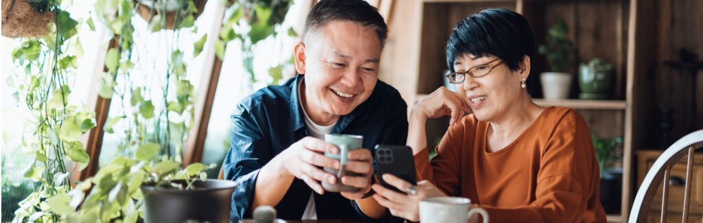 couple looking at questions on phone